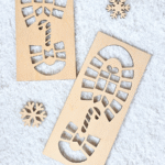 Medinis Kalėdų senelio pėdų trafaretas