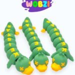 3D Flexi ančiukas su užrašu „Keistas“