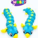 Figūrėlė Papūga su užrašu „Laisva“